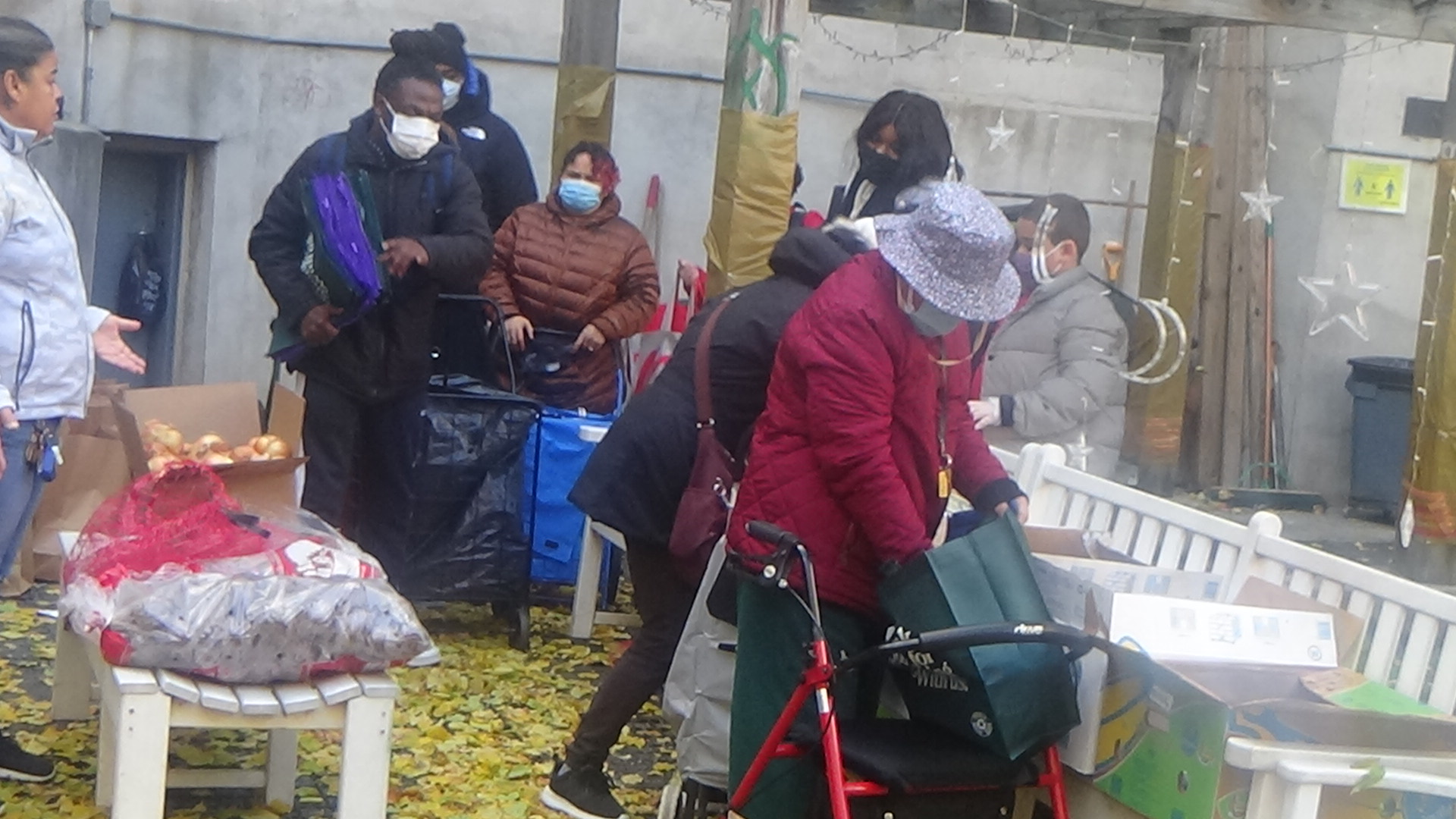Families and walkers gathered around tables during a winter outreach event